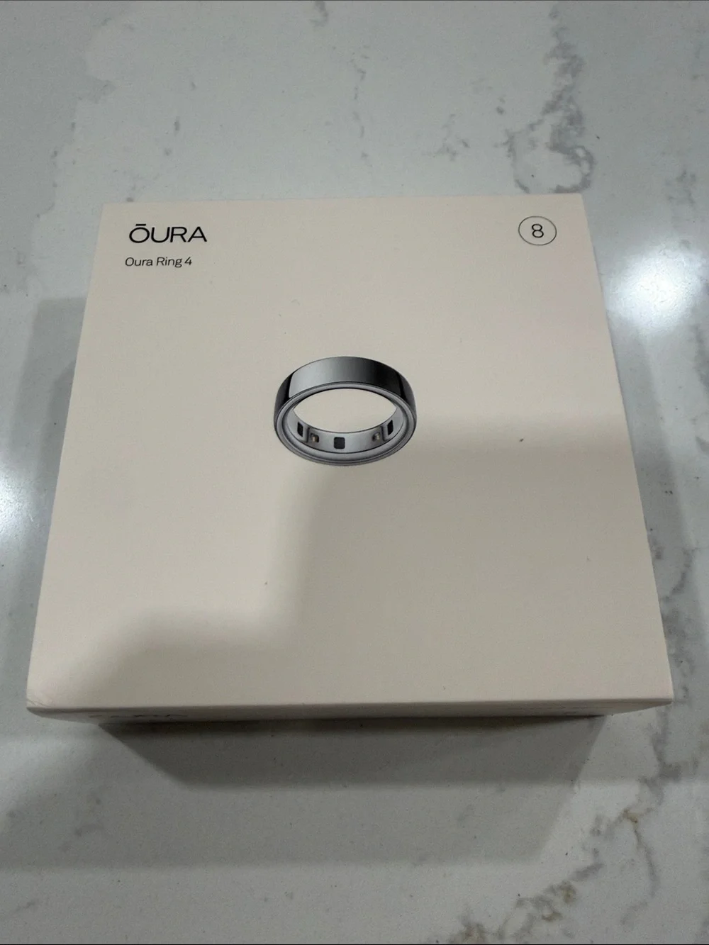 Oura Ring 4 Silver on Cream Box